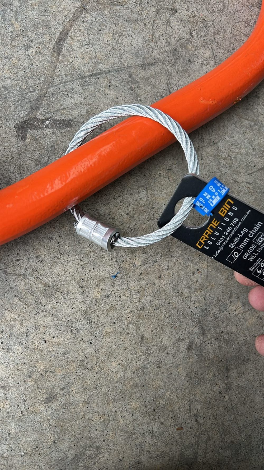 Wire rope sling with Crane Bin Solutions inspection tag